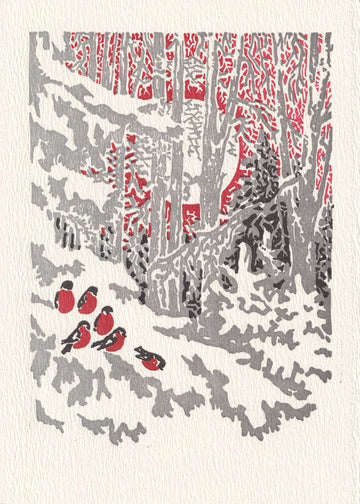 A greeting card featuring a winter scene with songbirds on a snowy branch, pine needles, and snowfall.